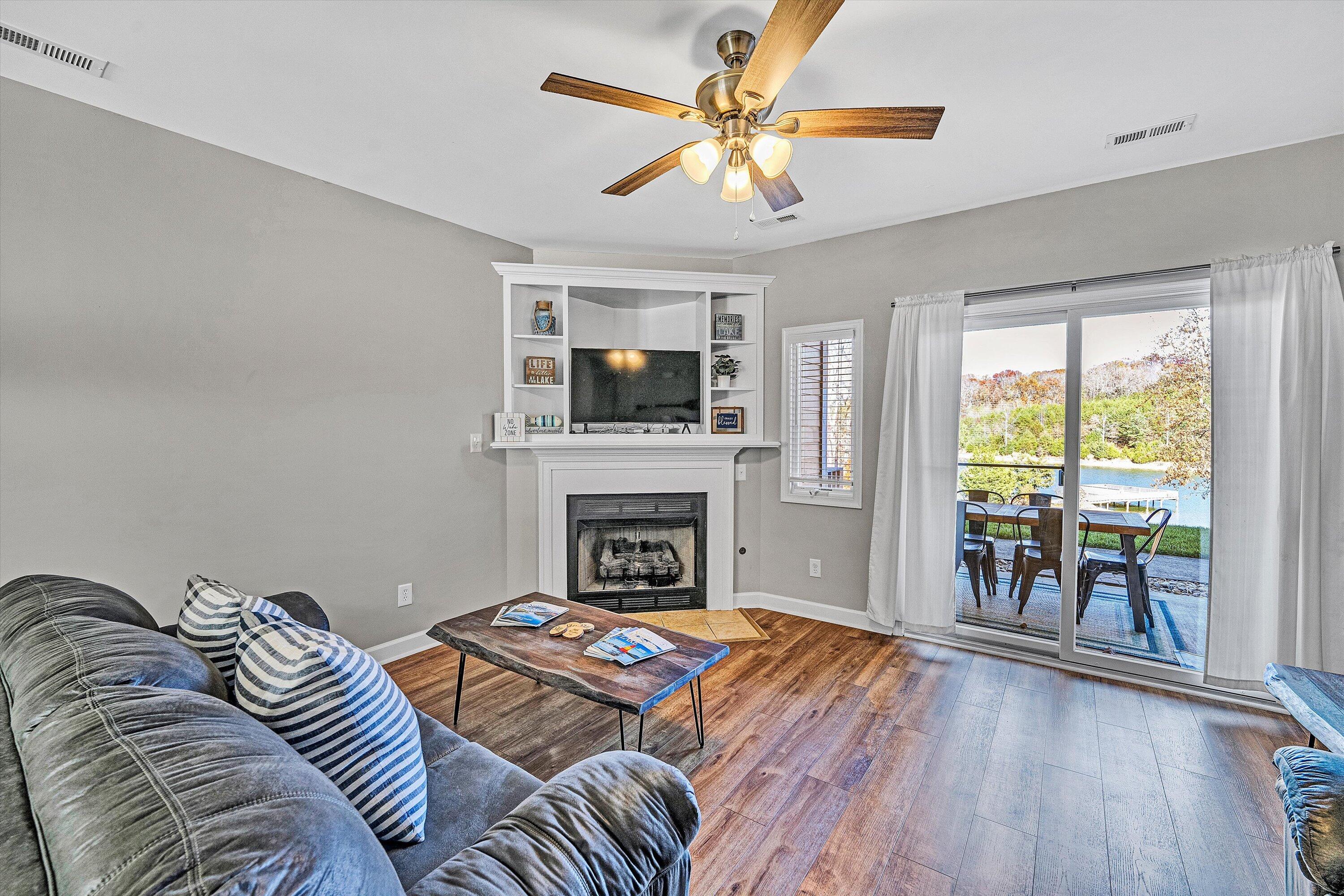 1175 Mariners Way, Unit 59 Huddleston, VA 24104 - Photo 12 of 44 a living room with furniture fireplace and a flat screen tv