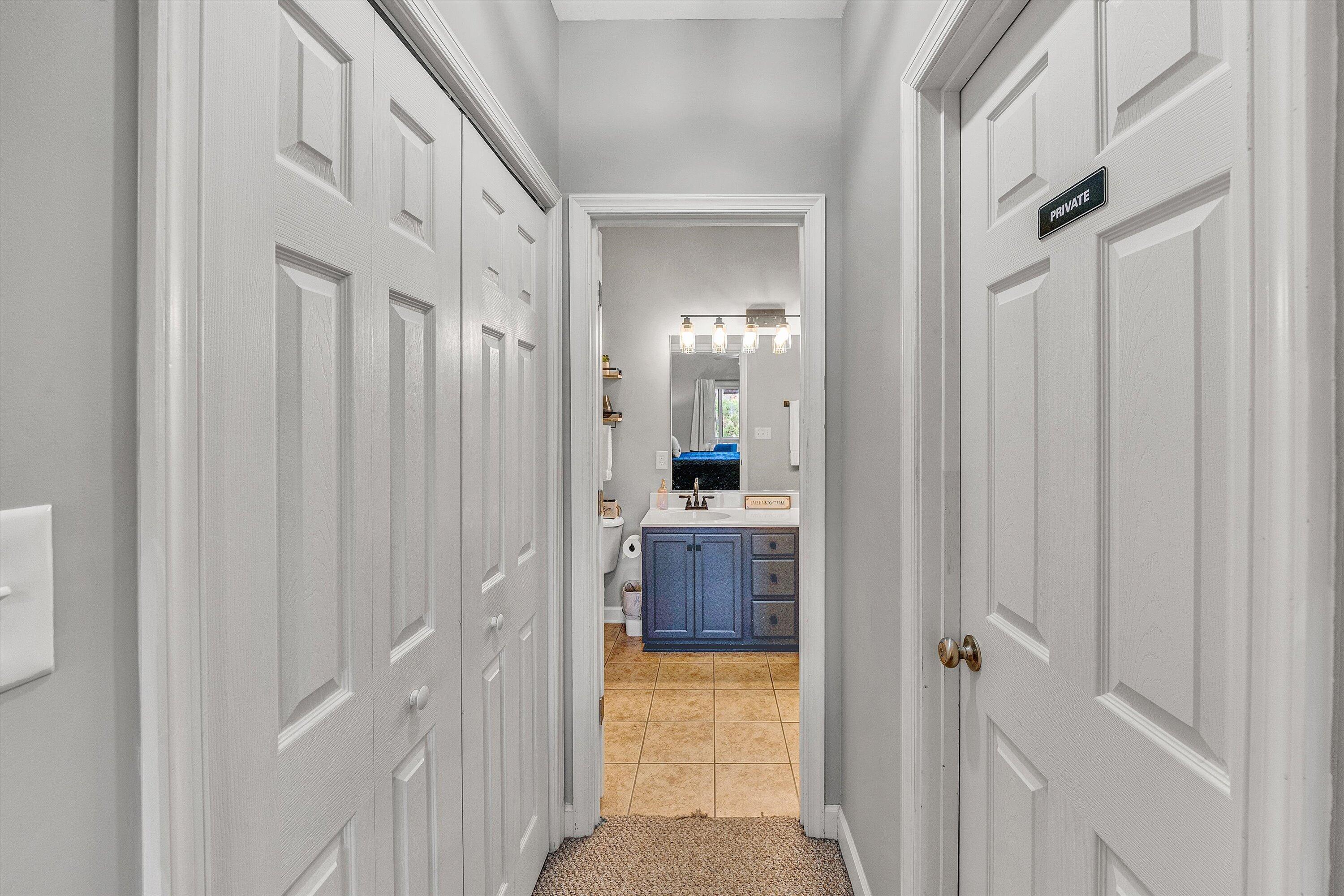 1175 Mariners Way, Unit 59 Huddleston, VA 24104 - Photo 18 of 44 a bathroom with a granite countertop sink and a mirror