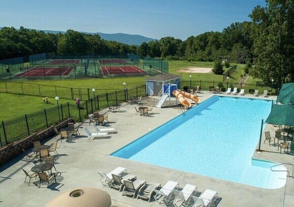 1175 Mariners Way, Unit 59 Huddleston, VA 24104 - Photo 43 of 44 swimming pool view with a lake view