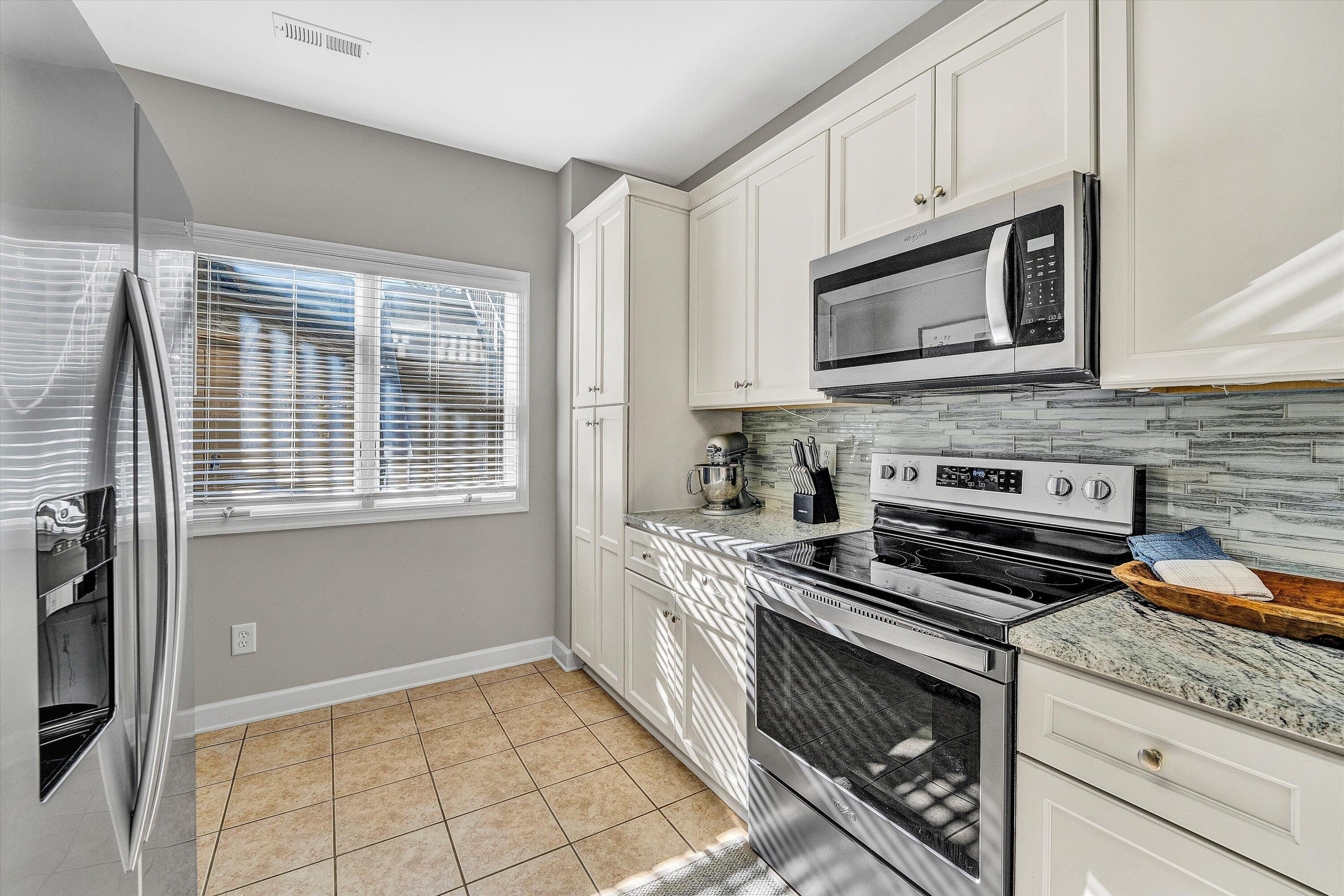 1175 Mariners Way, Unit 59 Huddleston, VA 24104 - Photo 6 of 44 a kitchen with cabinets appliances and a sink