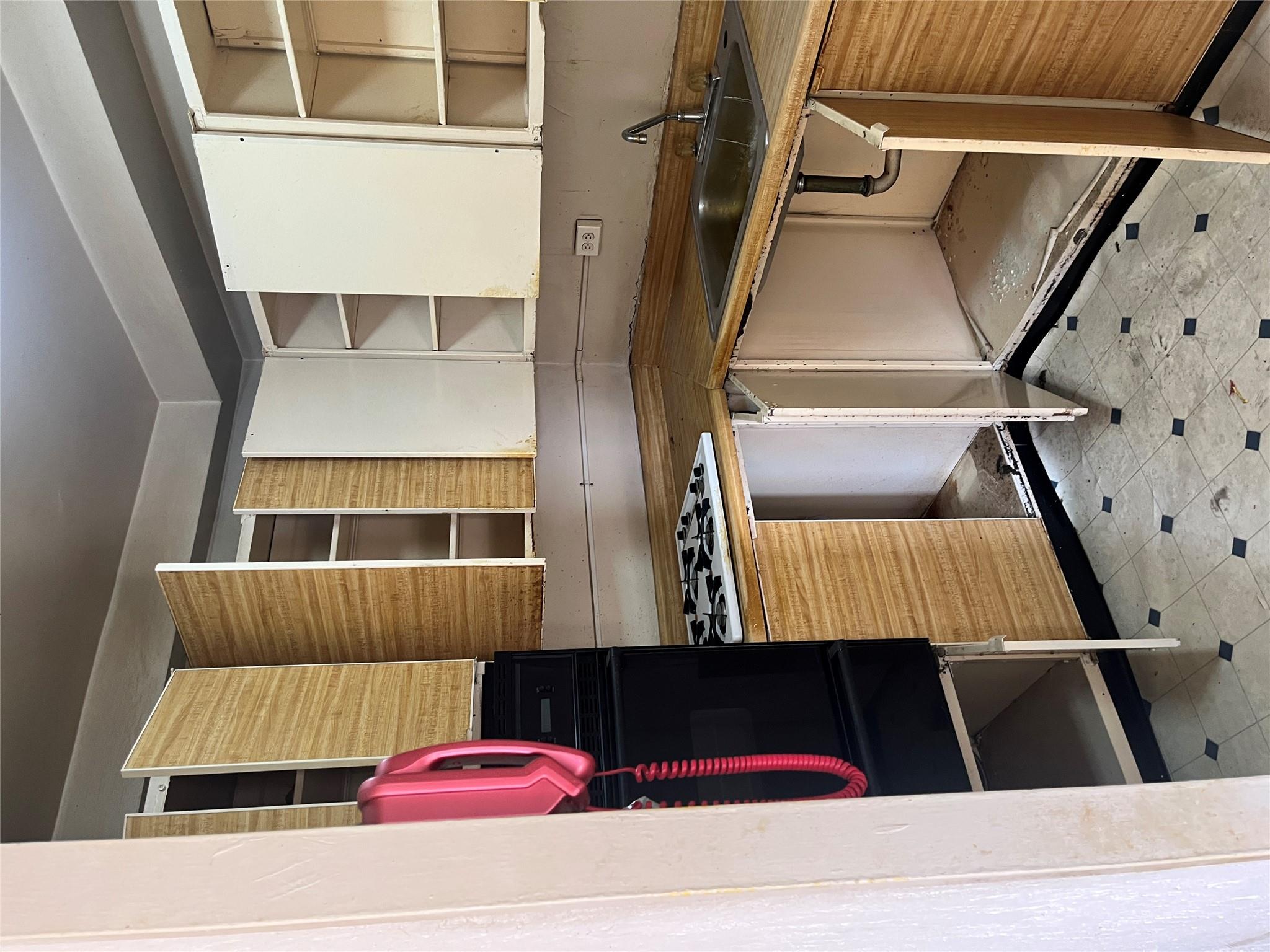 1020 Grand Concourse, Unit 23T Bronx, NY 10451 - Photo 12 of 13 Kitchen featuring cooktop, wall oven, and sink