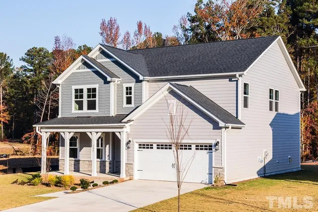 a view of a white house with a large windows