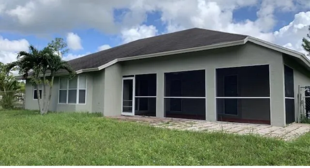 a house with yard in front of it