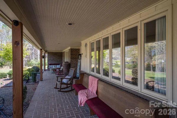 a view of swimming pool with outdoor seating