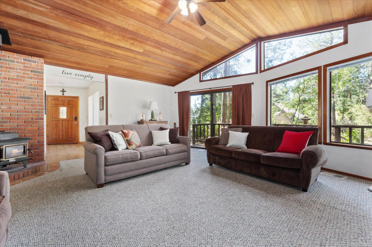 680 Larkspur Lane Murphys, CA 95247 - Photo 10 of 41 a living room with furniture and a large window