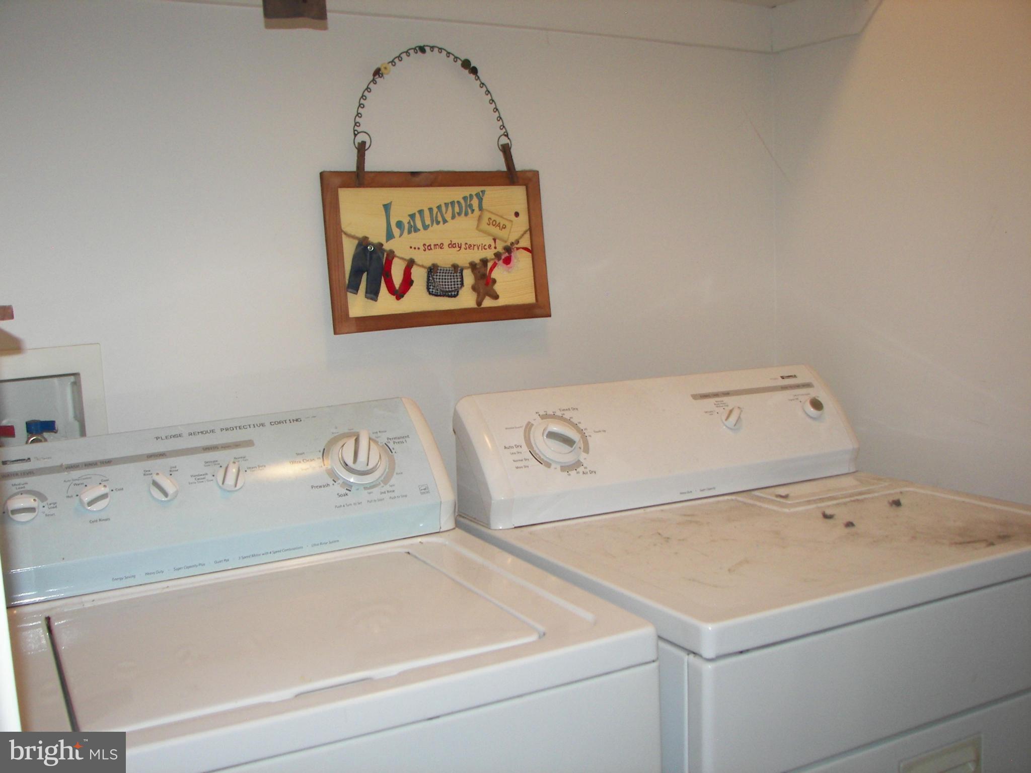 3619 Highland Ridge Road Berkeley Springs, WV 25411 - Photo 18 of 30 a utility room with dryer and washer