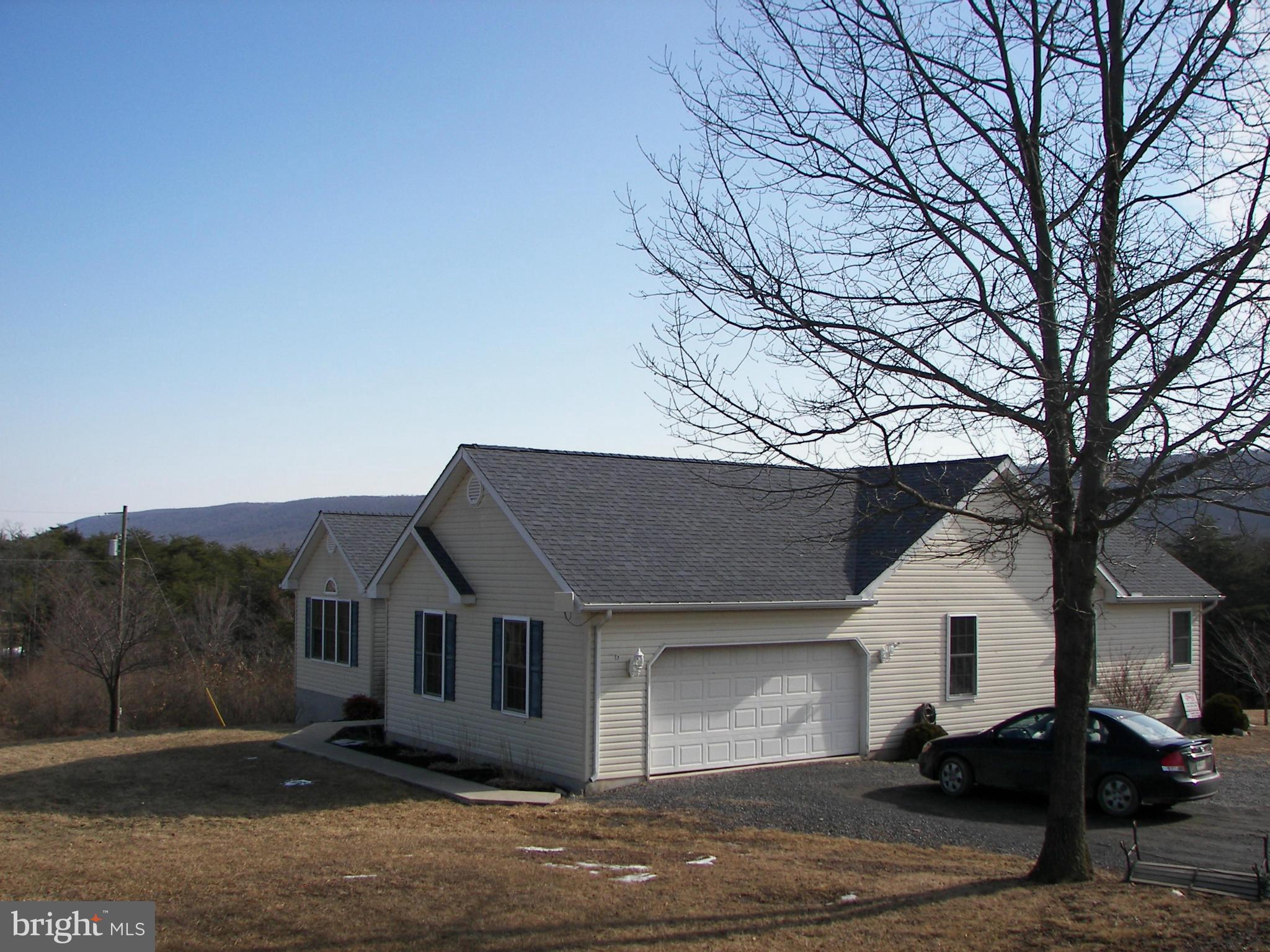 3619 Highland Ridge Road Berkeley Springs, WV 25411 - Photo 4 of 30 front view of house