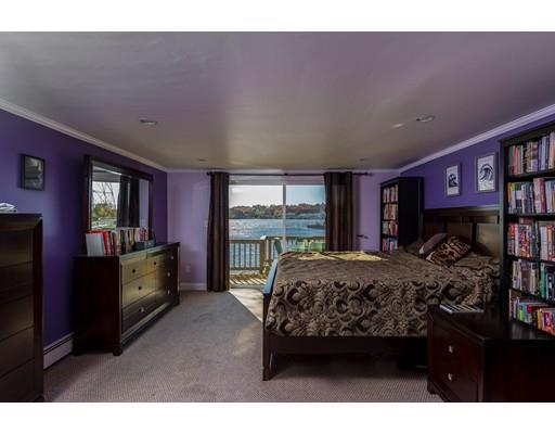 86 Bluff Road Weymouth, MA 02191 - Photo 9 of 18 a bedroom with a bed and large window