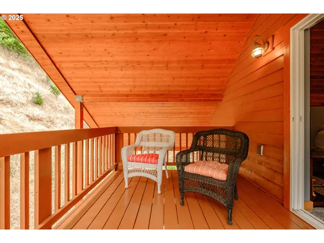 a balcony with wooden floor view