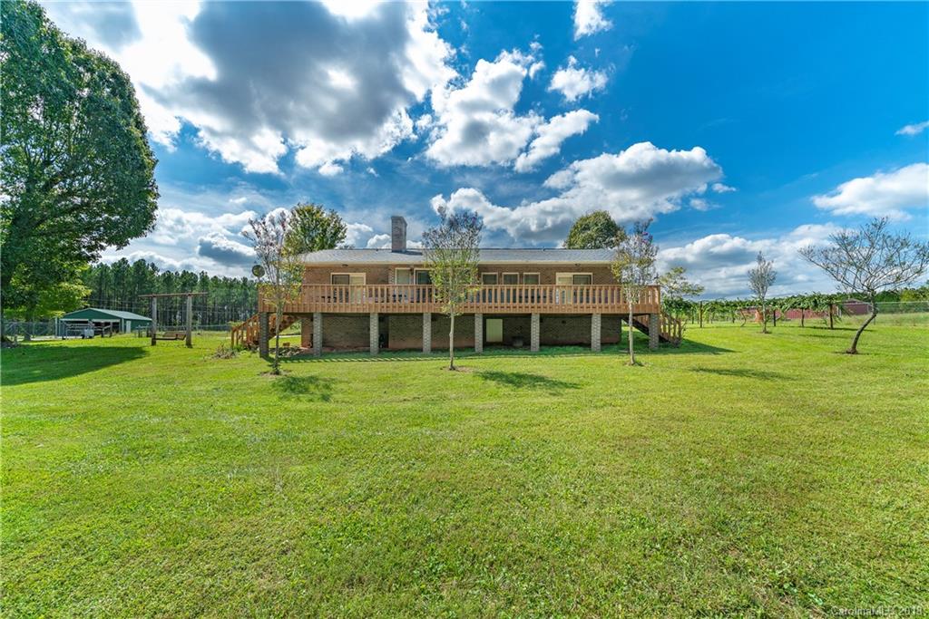 1775 Ebenezer Road Smyrna, SC 29743 - Photo 3 of 36 a view of a house with a big yard