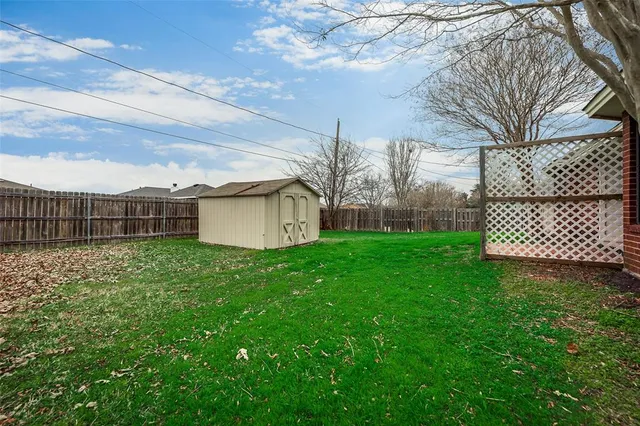 a view of a backyard with a garden