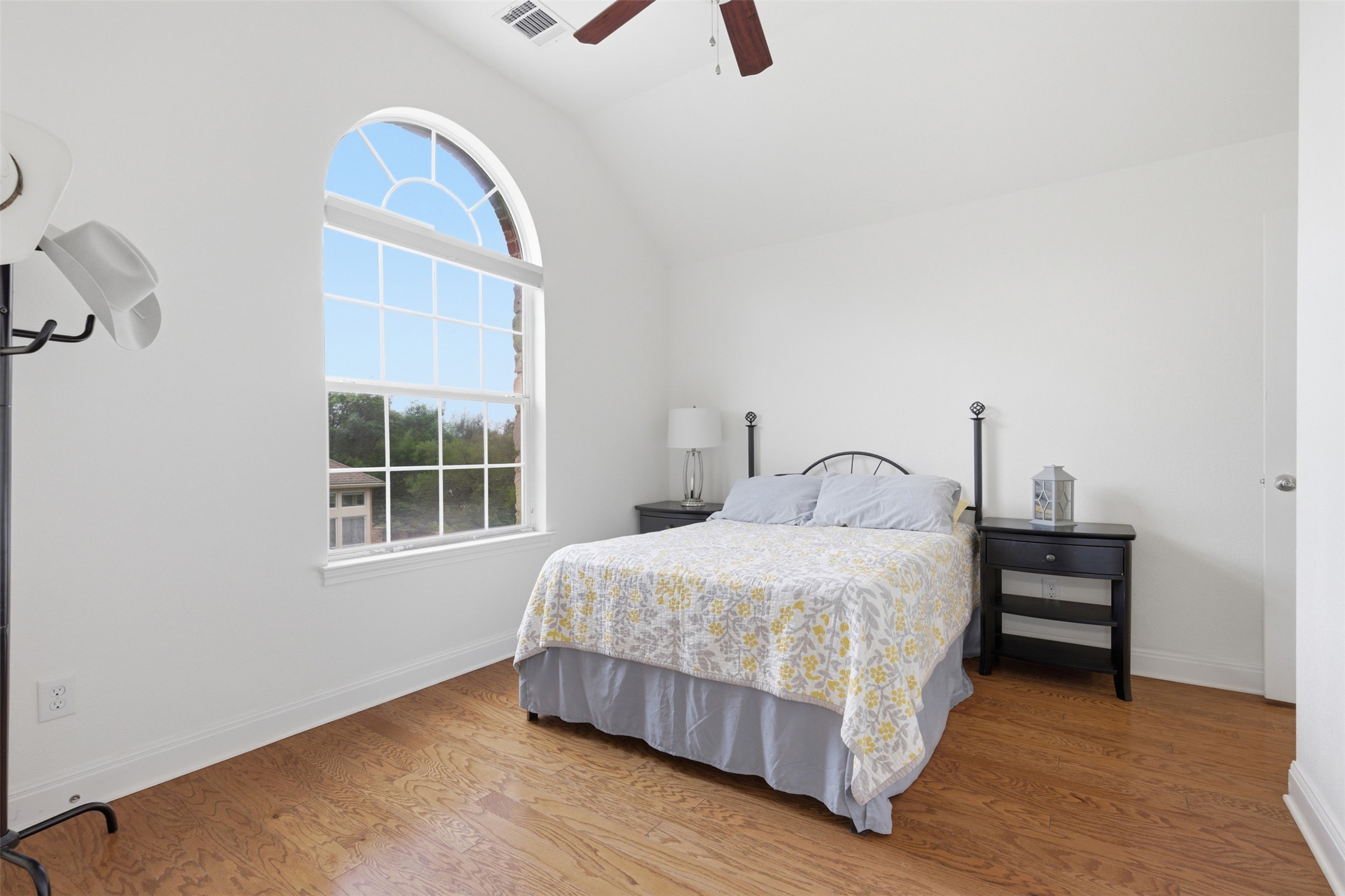 15331 Origins Lane Austin, TX 78734 - Photo 20 of 30 a bedroom with a bed and window