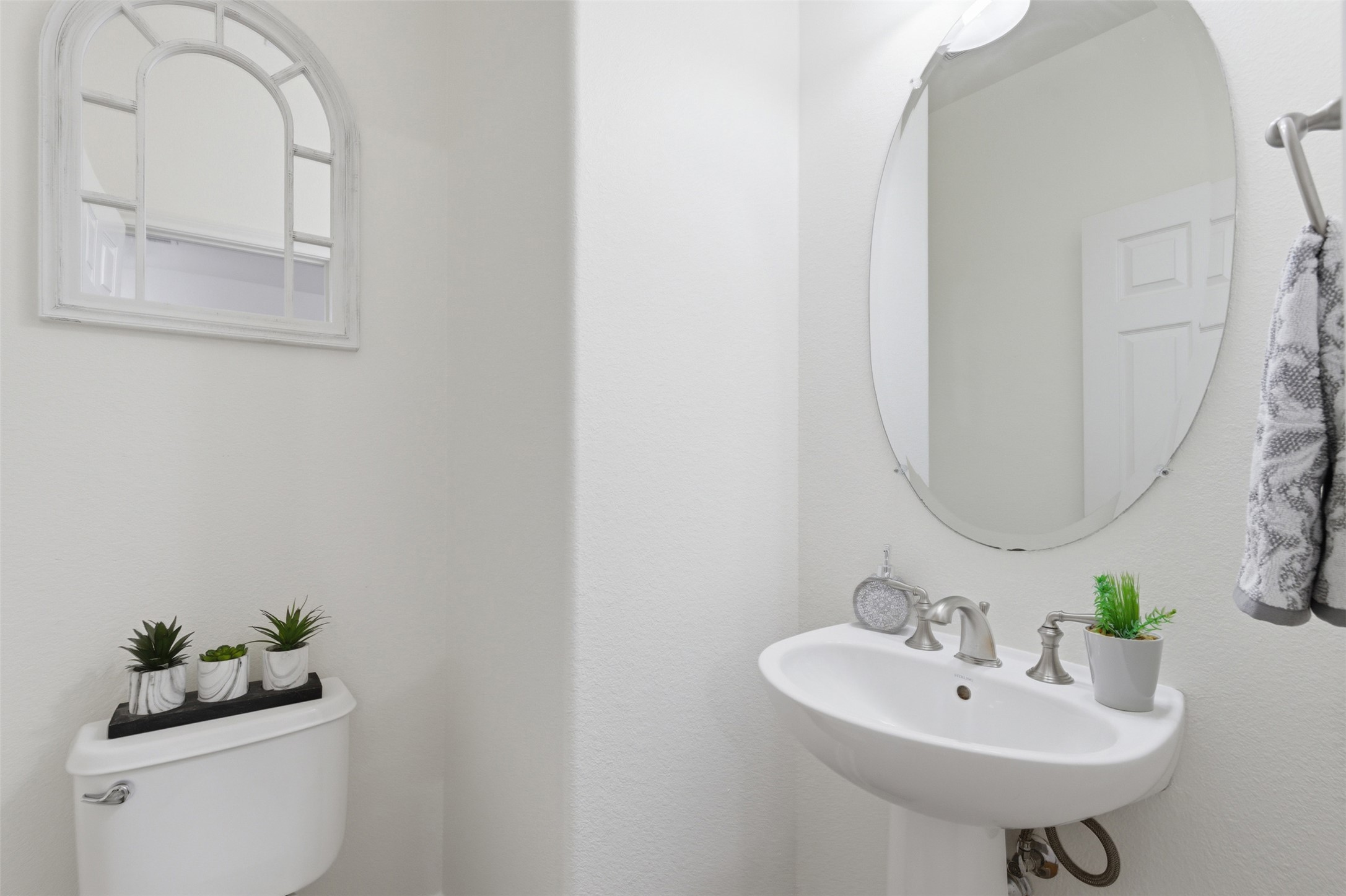 15331 Origins Lane Austin, TX 78734 - Photo 23 of 30 a bathroom with a sink and a mirror