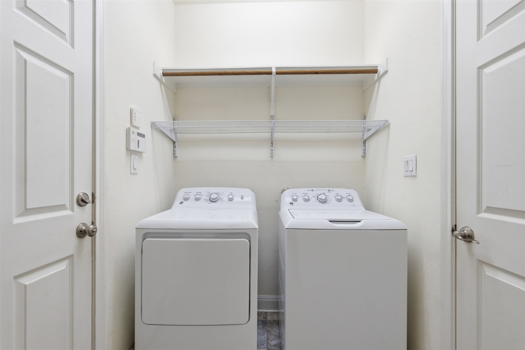 15331 Origins Lane Austin, TX 78734 - Photo 24 of 30 a utility room with dryer and washer