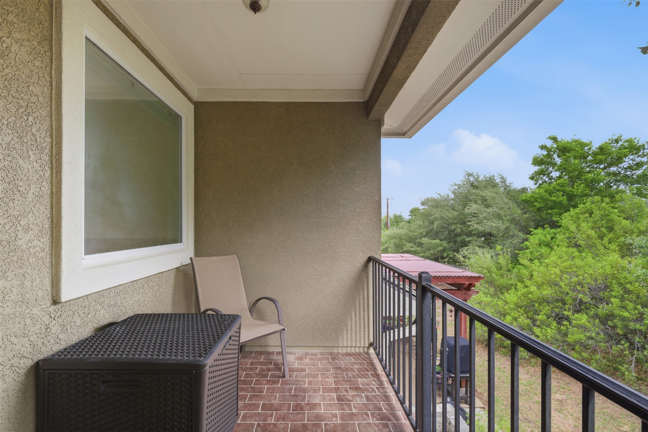 15331 Origins Lane Austin, TX 78734 - Photo 25 of 30 a balcony view with two chairs and a potted plant