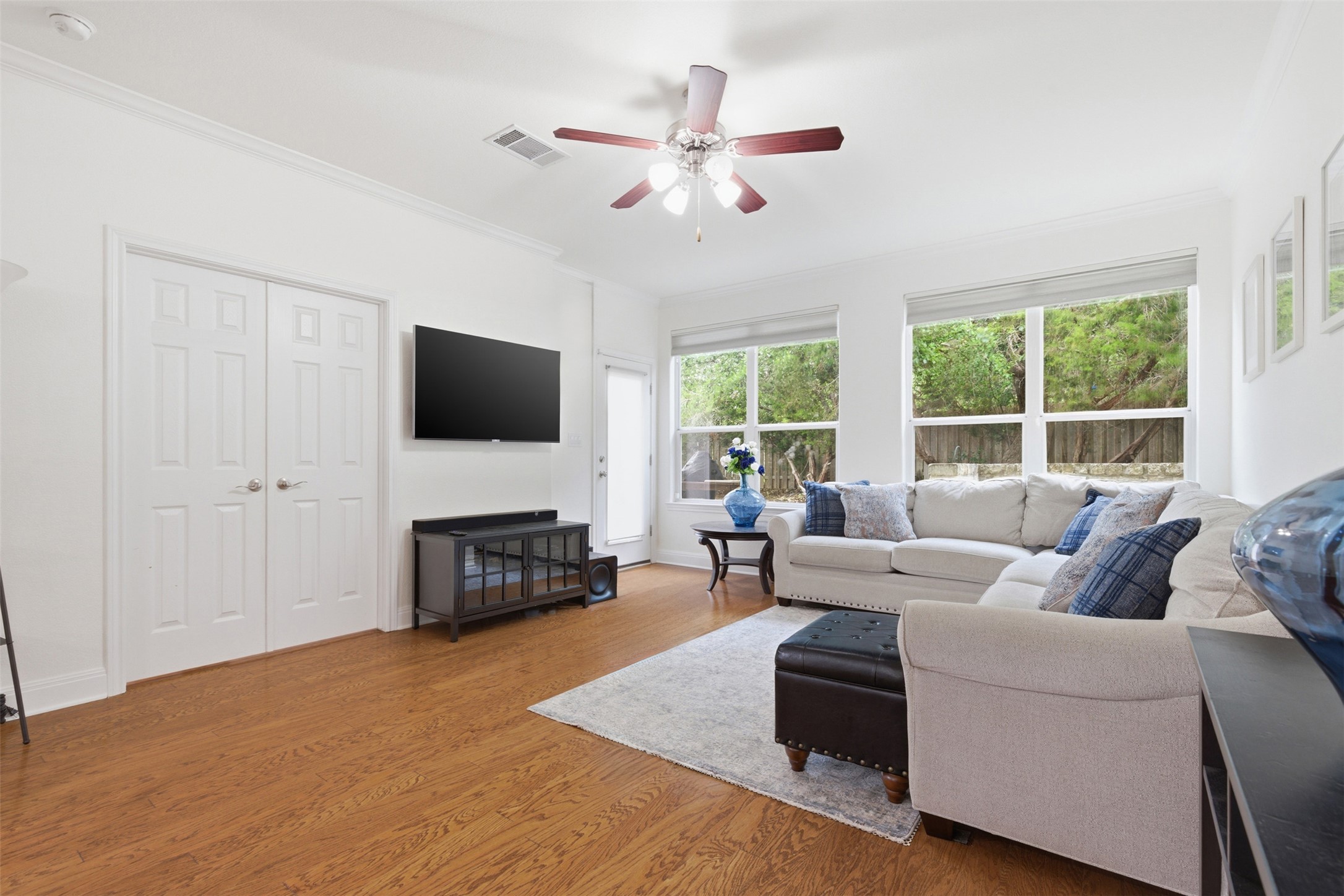 15331 Origins Lane Austin, TX 78734 - Photo 6 of 30 a living room with furniture fireplace and flat screen tv