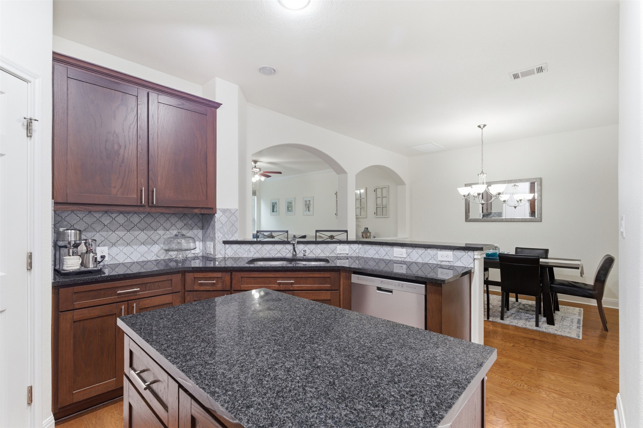 15331 Origins Lane Austin, TX 78734 - Photo 10 of 30 a kitchen with a stove and a sink