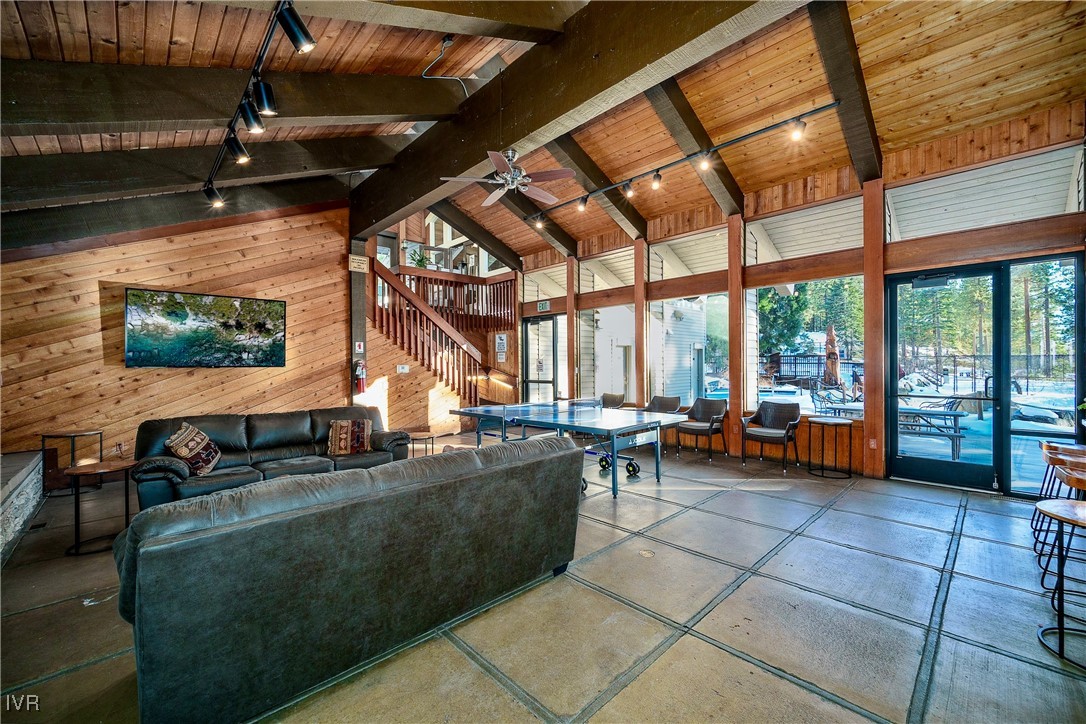 105 Rubicon Circle North, Unit B Stateline, NV 89449 - Photo 31 of 32 a living room with furniture and a flat screen tv