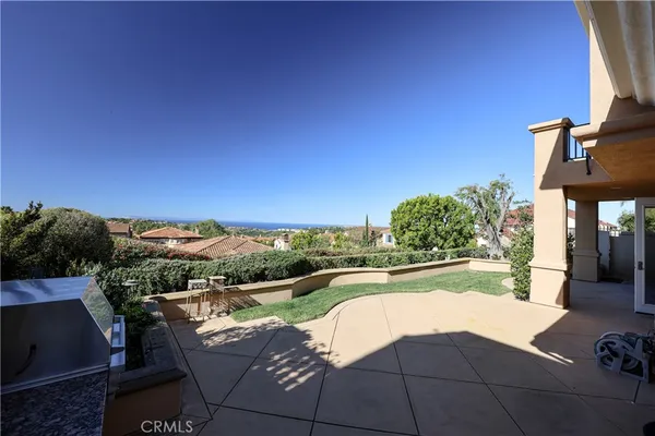 a view of a terrace with sitting area