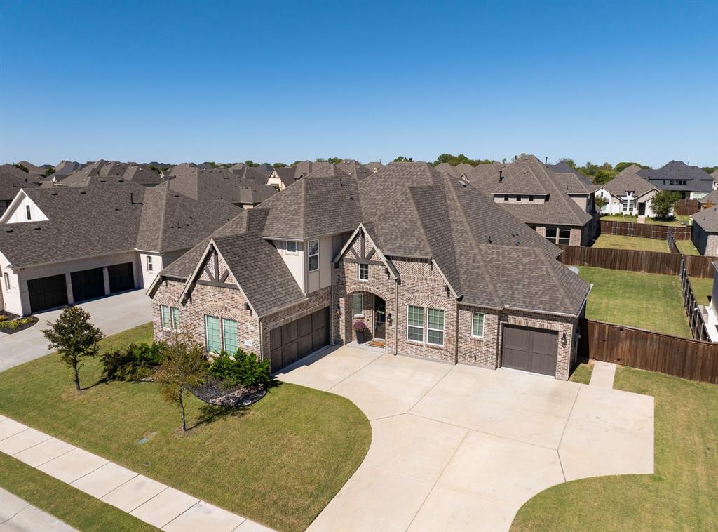 1316 Kirkwood Road Rockwall, TX 75087 - Photo 37 of 37 an aerial view of a house with a yard
