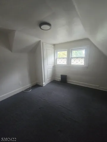 an empty room that has a window