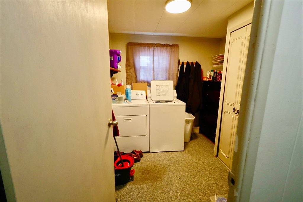 42 Better Way Springfield, MA 01119 - Photo 15 of 18 a utility room with dryer and washer