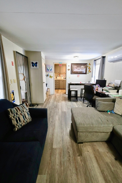 42 Better Way Springfield, MA 01119 - Photo 8 of 18 a living room with furniture and a couch