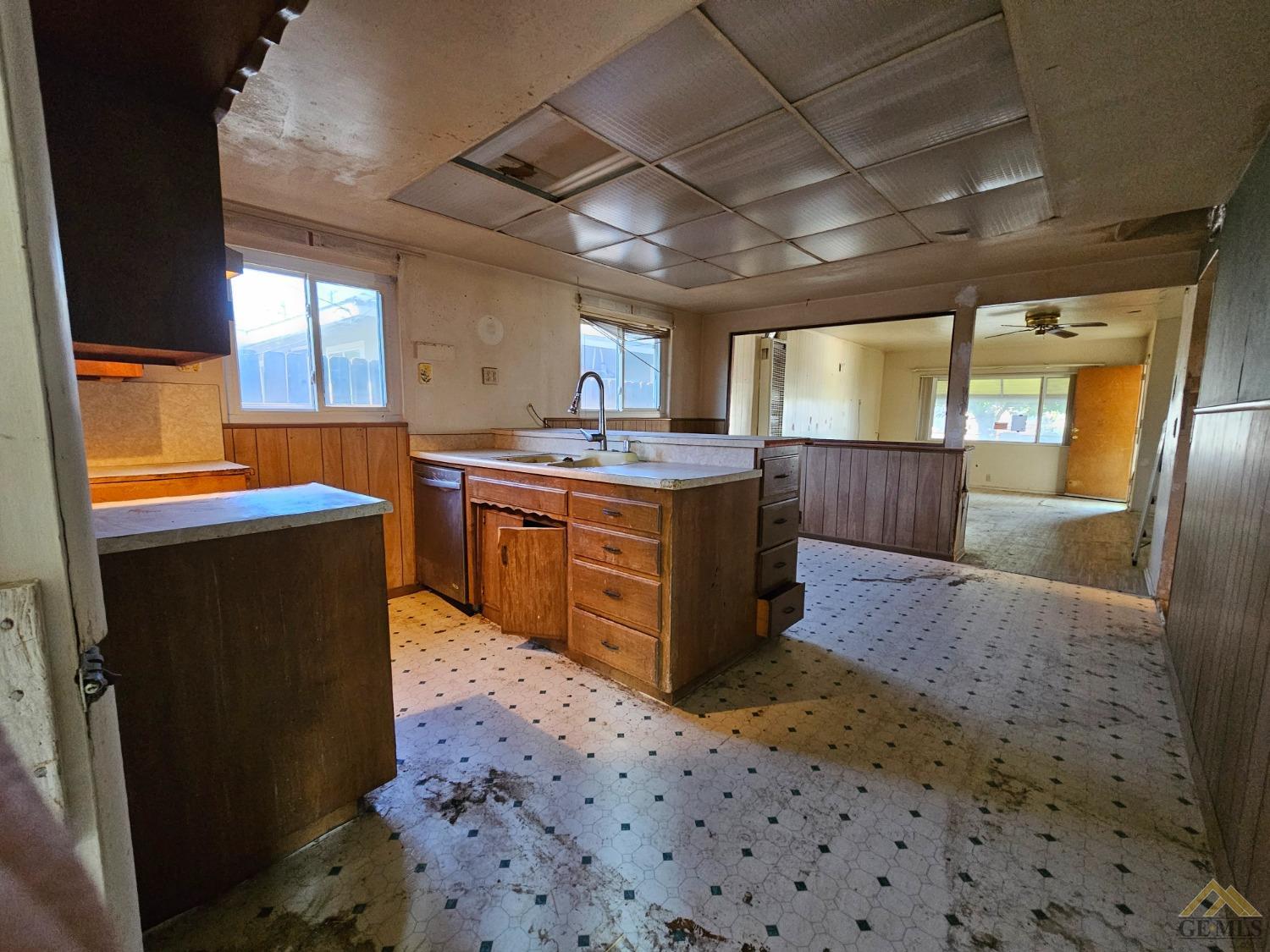 Undisclosed Address Taft, CA 93268 - Photo 15 of 20 a kitchen with stainless steel appliances granite countertop a stove a sink dishwasher and a refrigerator