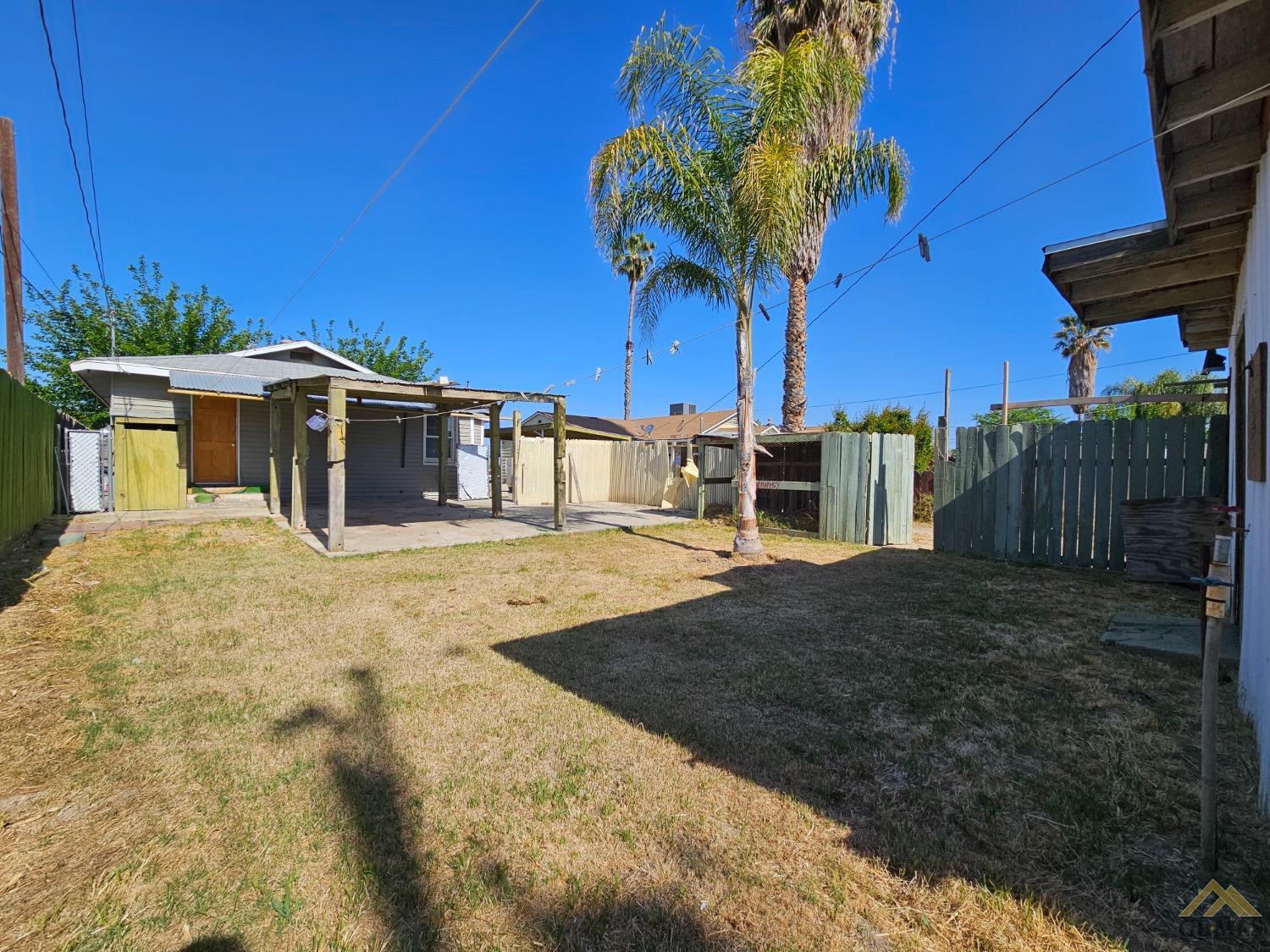 Undisclosed Address Taft, CA 93268 - Photo 20 of 20 a view of a house with a yard
