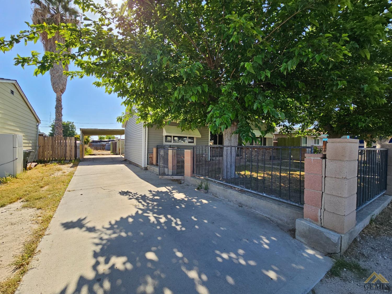 Undisclosed Address Taft, CA 93268 - Photo 4 of 20 a sign board with yard in front of it