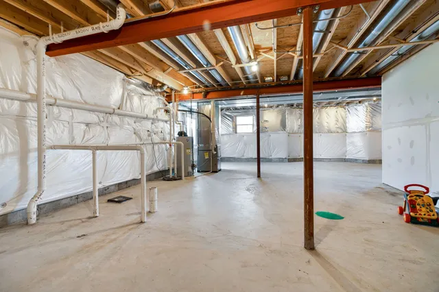 a view of a room with wooden walls