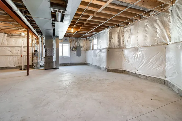 a view of a room with wooden walls
