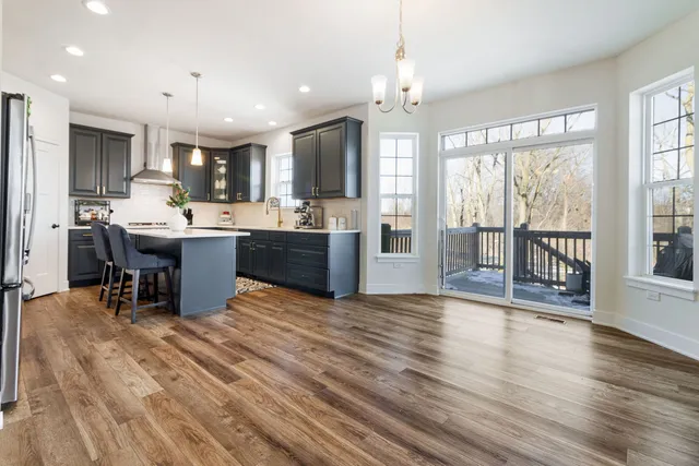 a view of kitchen with sink and microwave