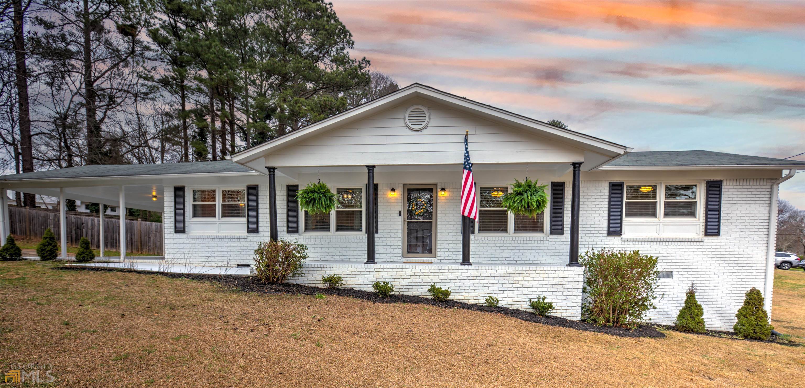 4535 Woodward Road Mableton, GA 30126 - Photo 1 of 1 front view of a house with a yard