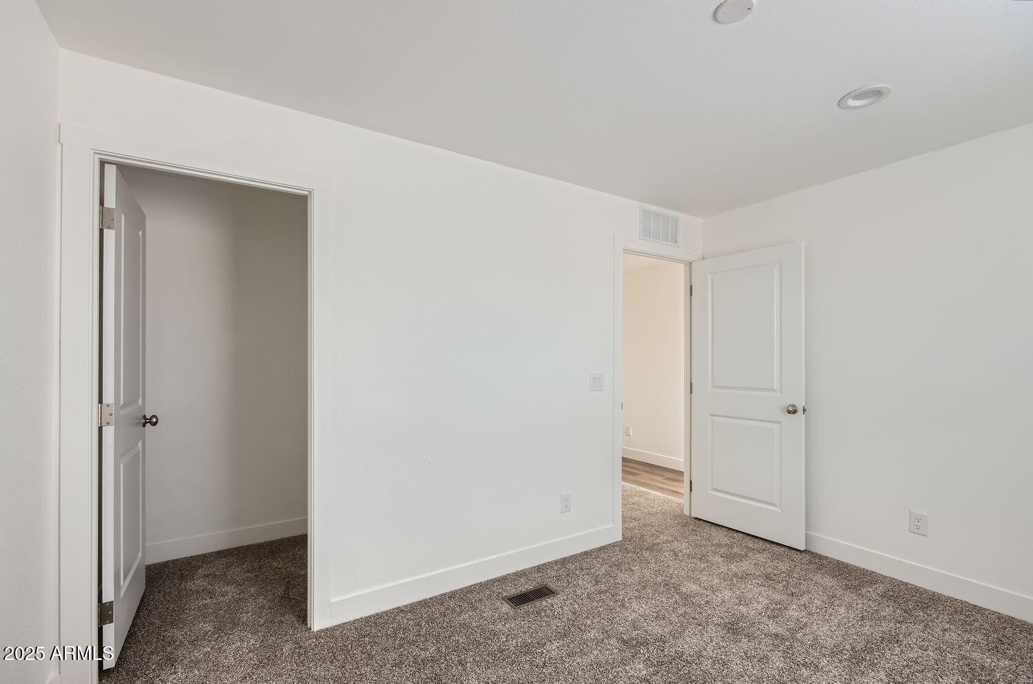 54362 West Thola Road Maricopa, AZ 85139 - Photo 5 of 9 a view of an empty room