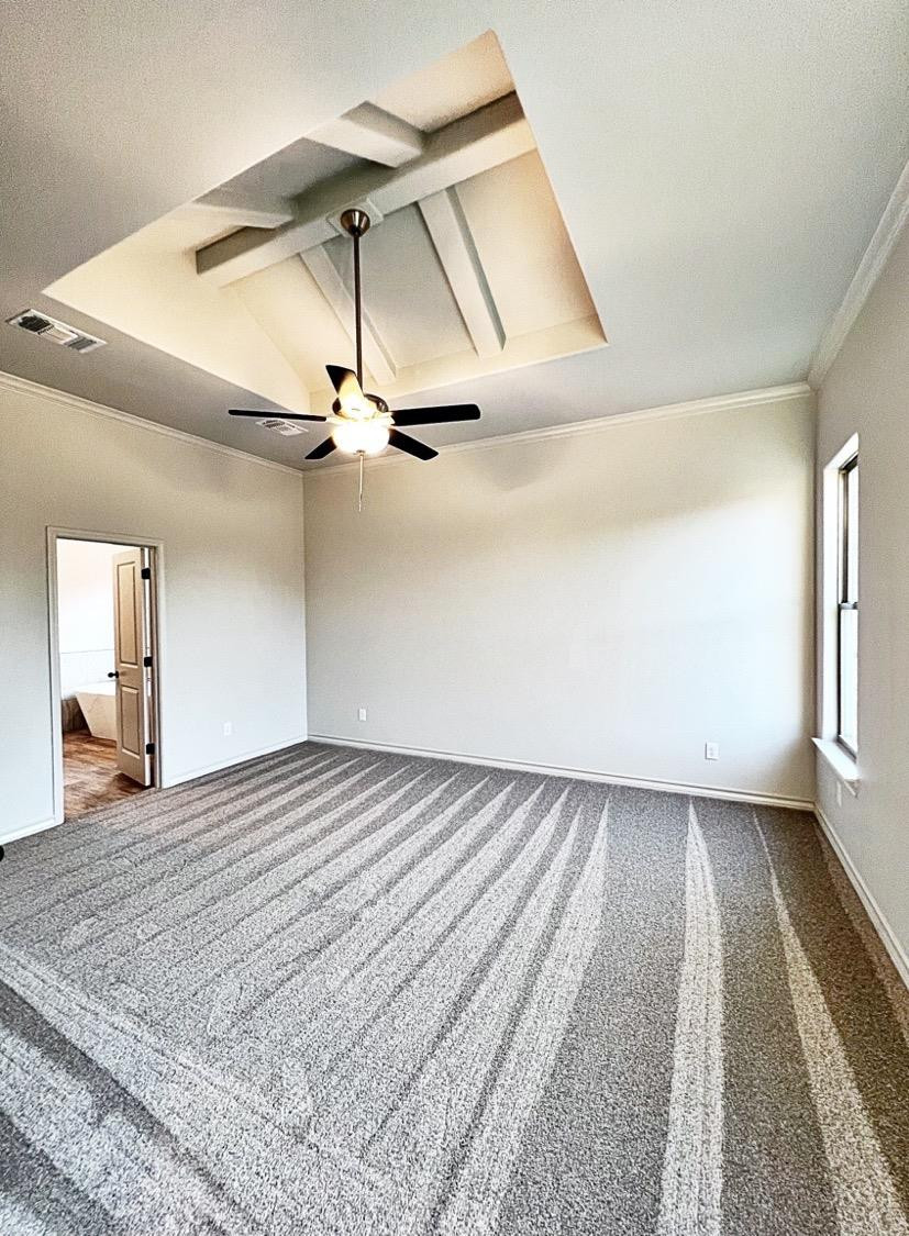 6920 17th Street Lubbock, TX 79416 - Photo 15 of 34 a view of a room with a ceiling fan