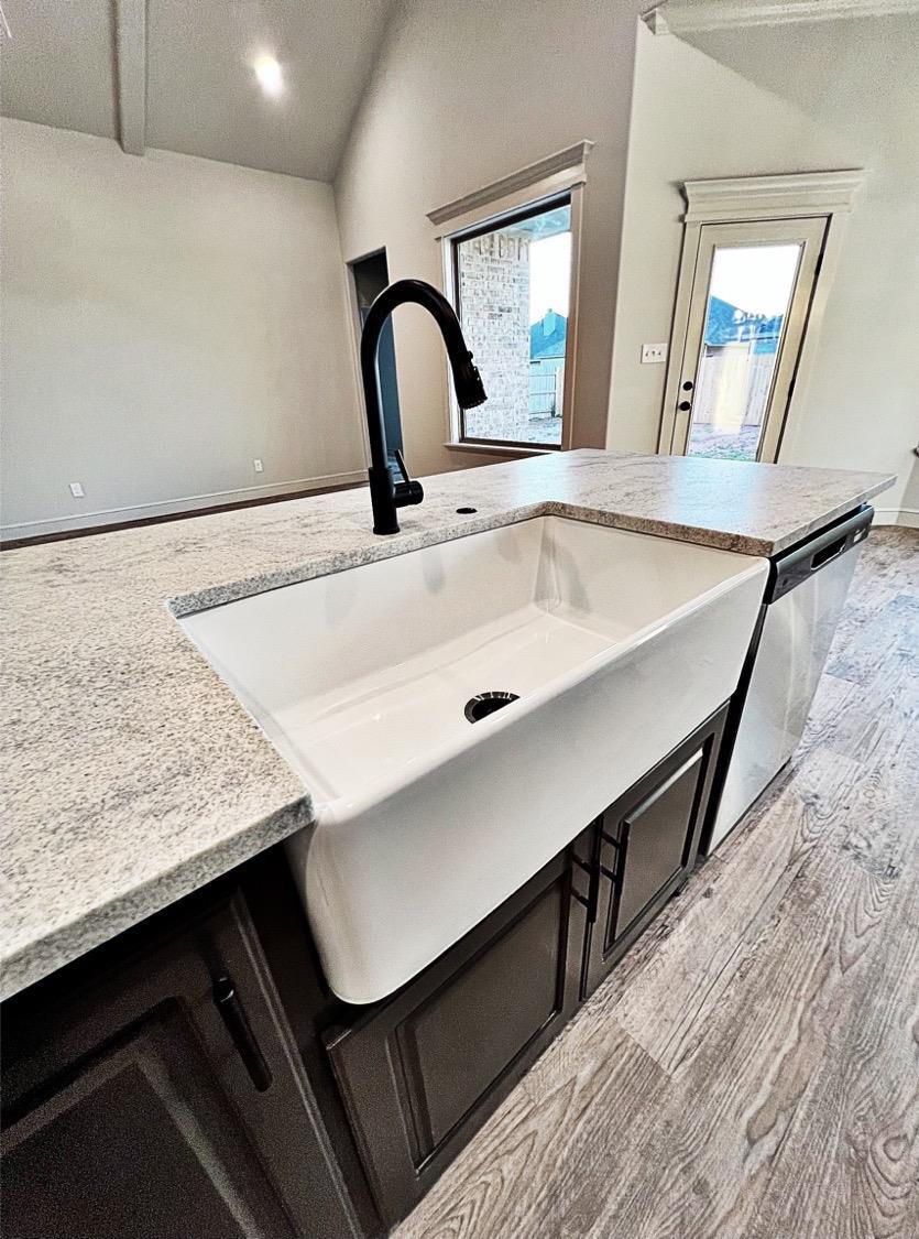 6920 17th Street Lubbock, TX 79416 - Photo 9 of 34 a close view of sink and tap