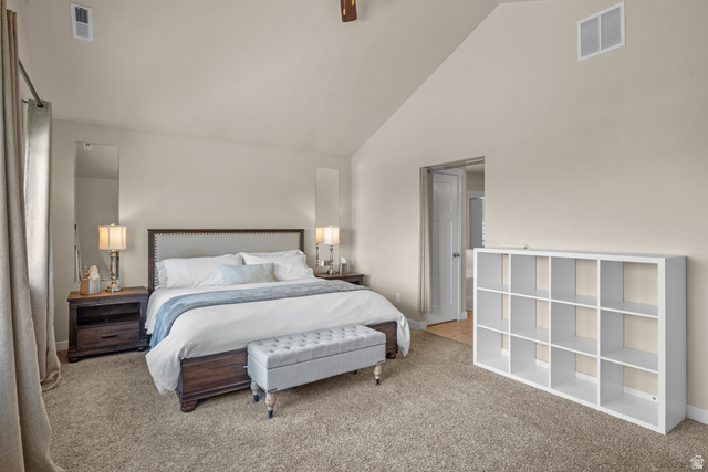 955 Delorean Lane Midvale, UT 84047 - Photo 25 of 47 Vaulted ceiling bedroom with neutral carpeting