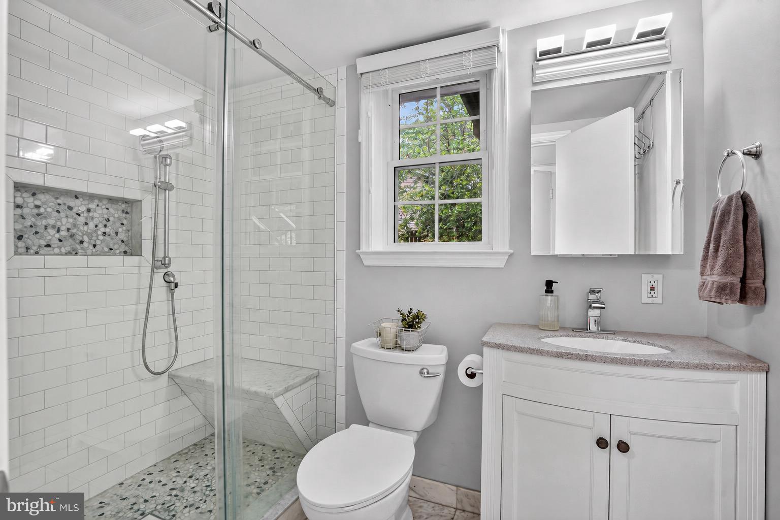 5024 Portsmouth Road Fairfax, VA 22032 - Photo 24 of 38 a bathroom with a sink toilet and shower