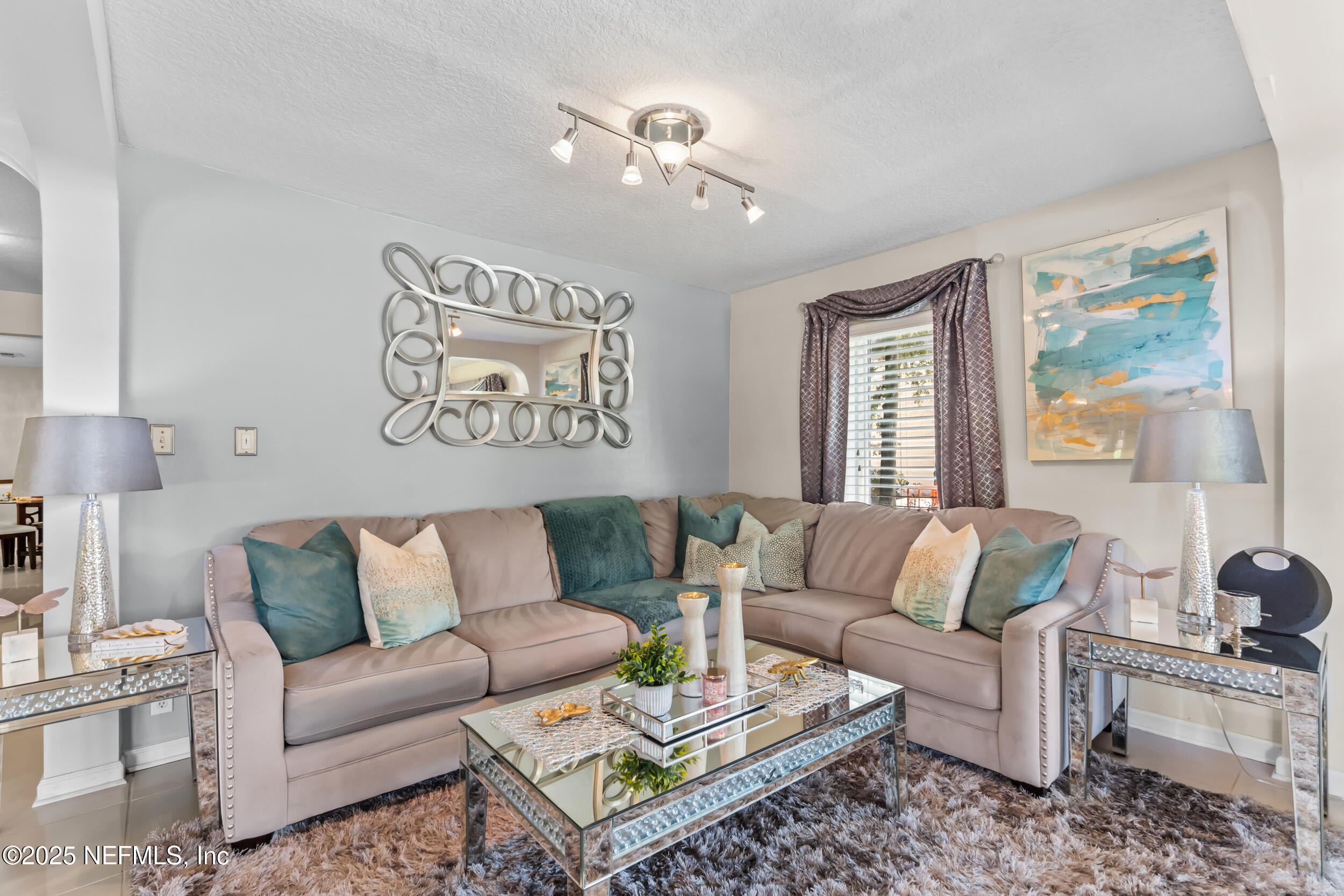1887 Mayport Road Atlantic Beach, FL 32233 - Photo 13 of 50 a living room with furniture and a large window