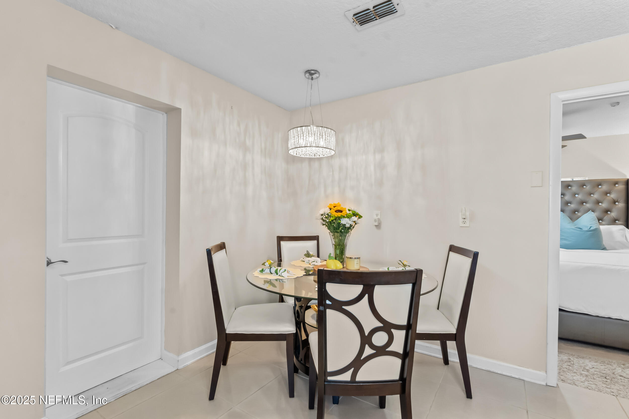 1887 Mayport Road Atlantic Beach, FL 32233 - Photo 15 of 50 a view of a dining room with furniture and window