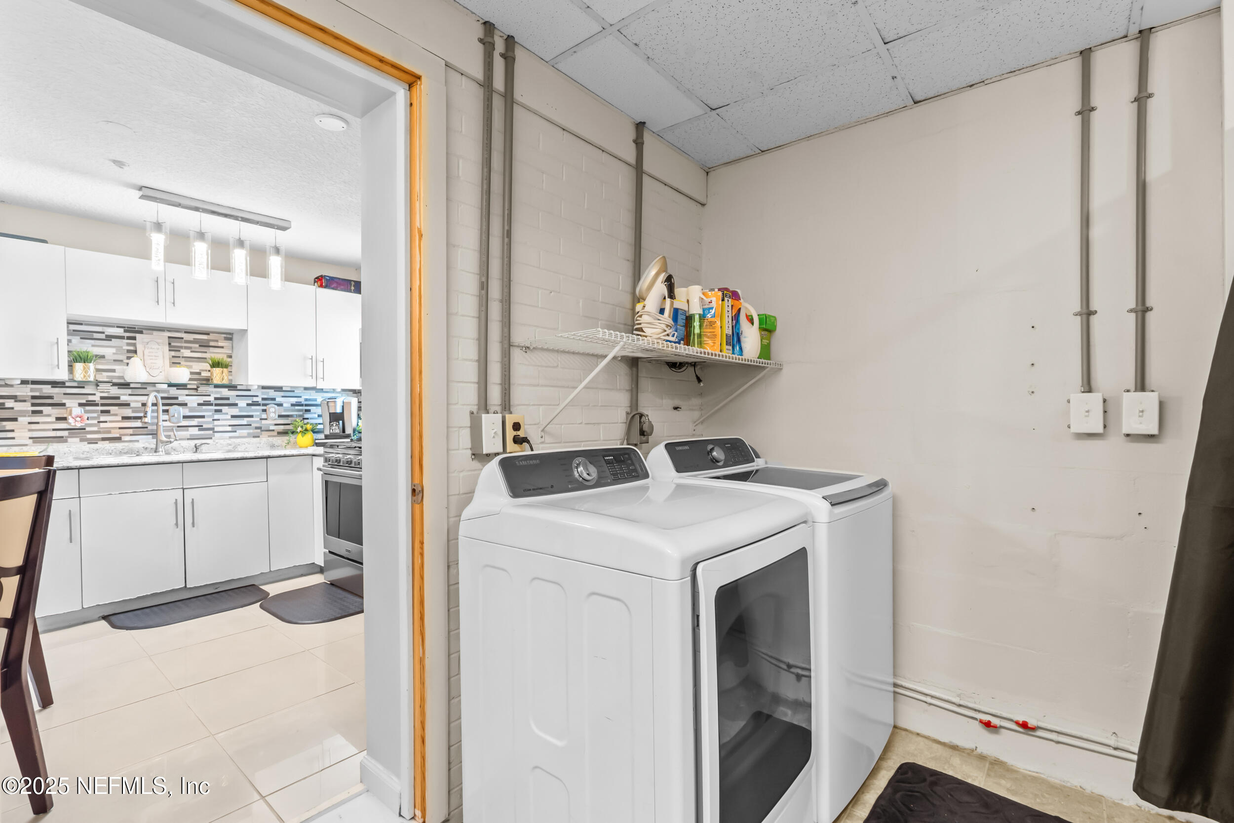1887 Mayport Road Atlantic Beach, FL 32233 - Photo 29 of 50 a utility room with washer and dryer