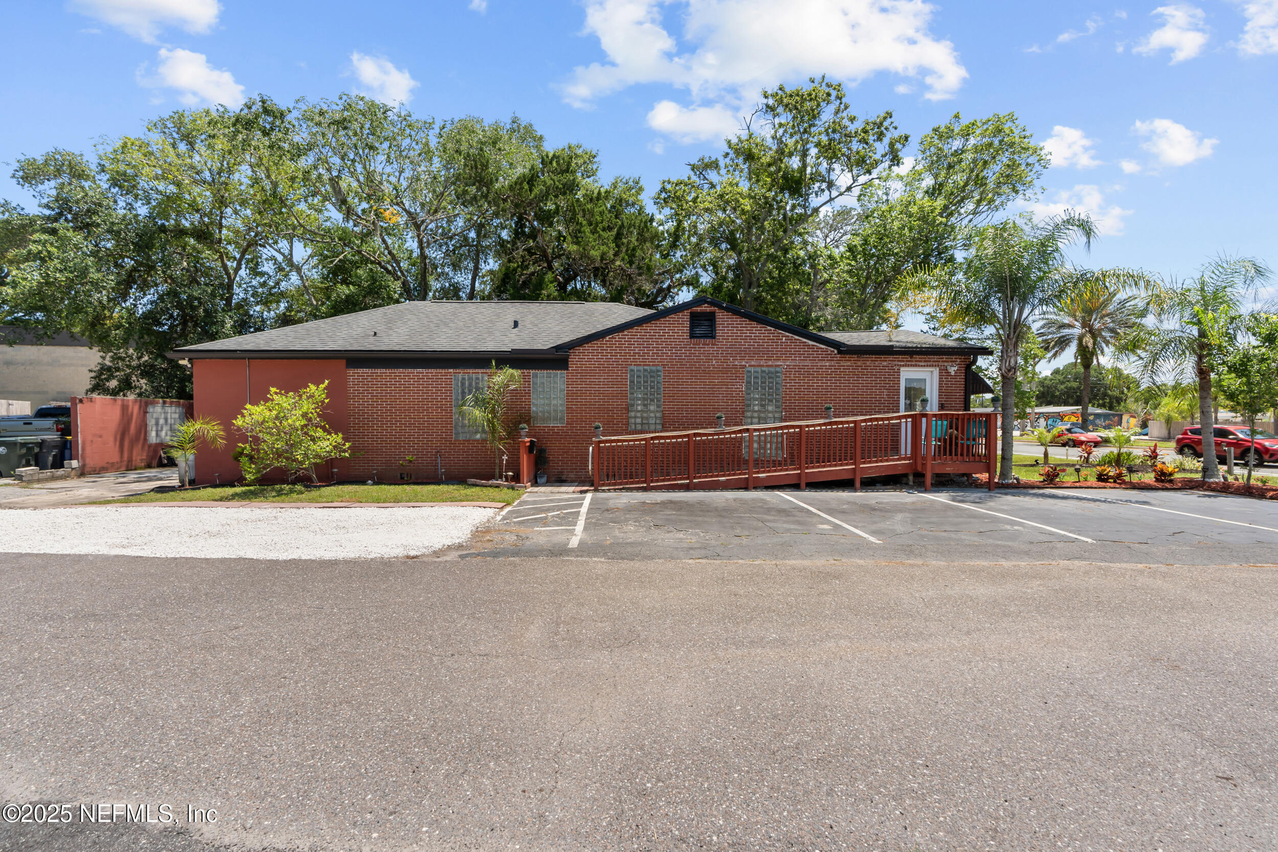 1887 Mayport Road Atlantic Beach, FL 32233 - Photo 30 of 50 a front view of a house with a yard