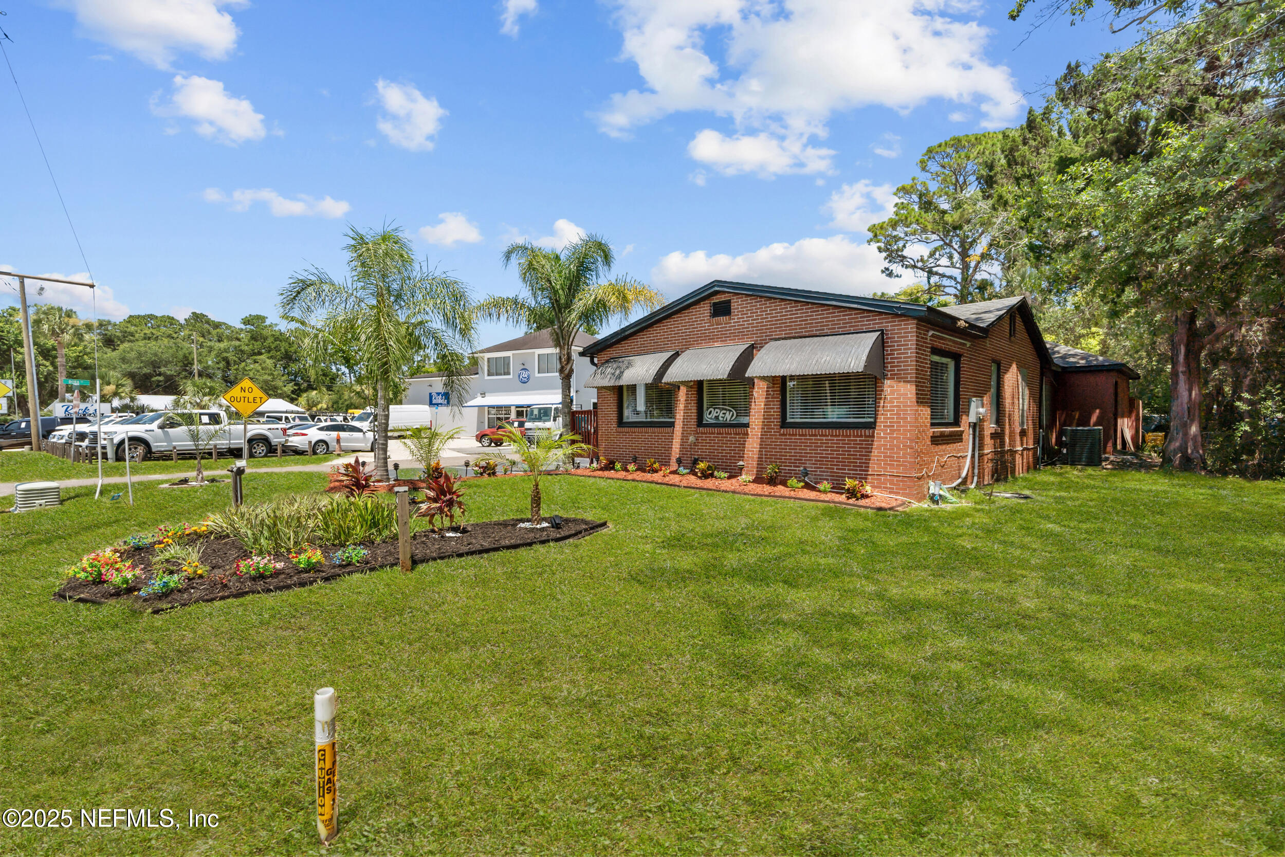 1887 Mayport Road Atlantic Beach, FL 32233 - Photo 3 of 50 a view of a house with a yard