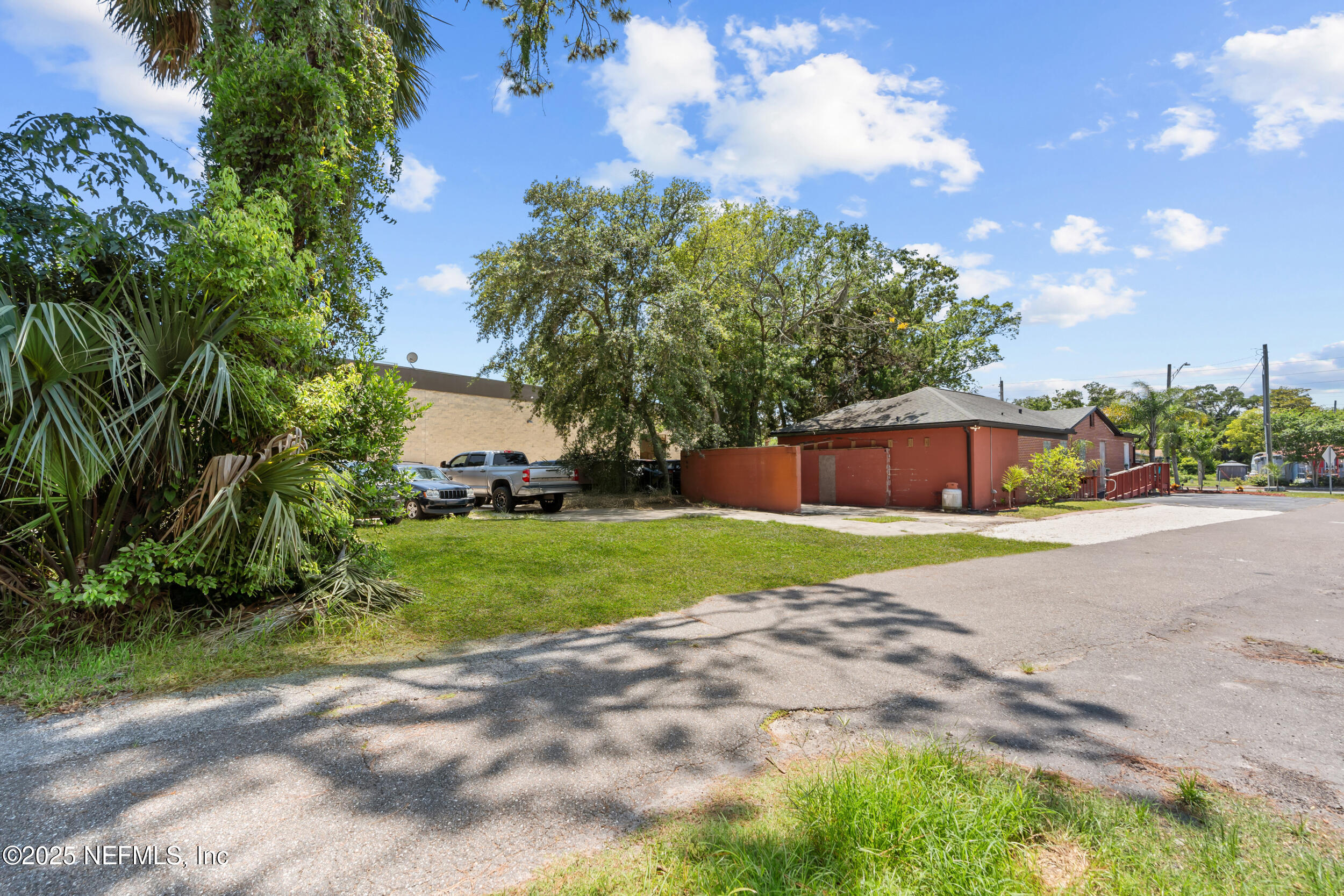 1887 Mayport Road Atlantic Beach, FL 32233 - Photo 32 of 50 a view of a yard and entertaining space