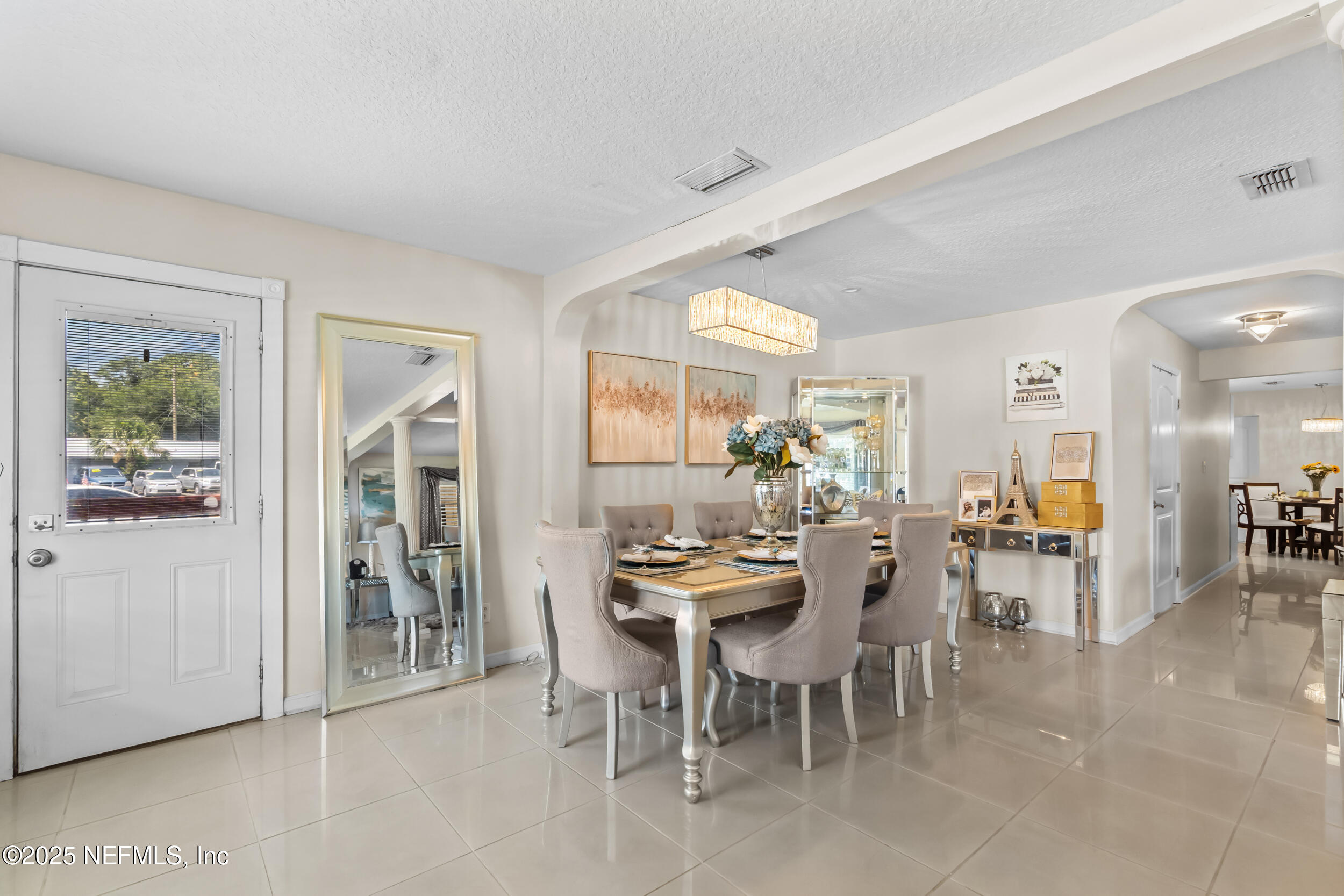 1887 Mayport Road Atlantic Beach, FL 32233 - Photo 10 of 50 a view of a dining room with furniture