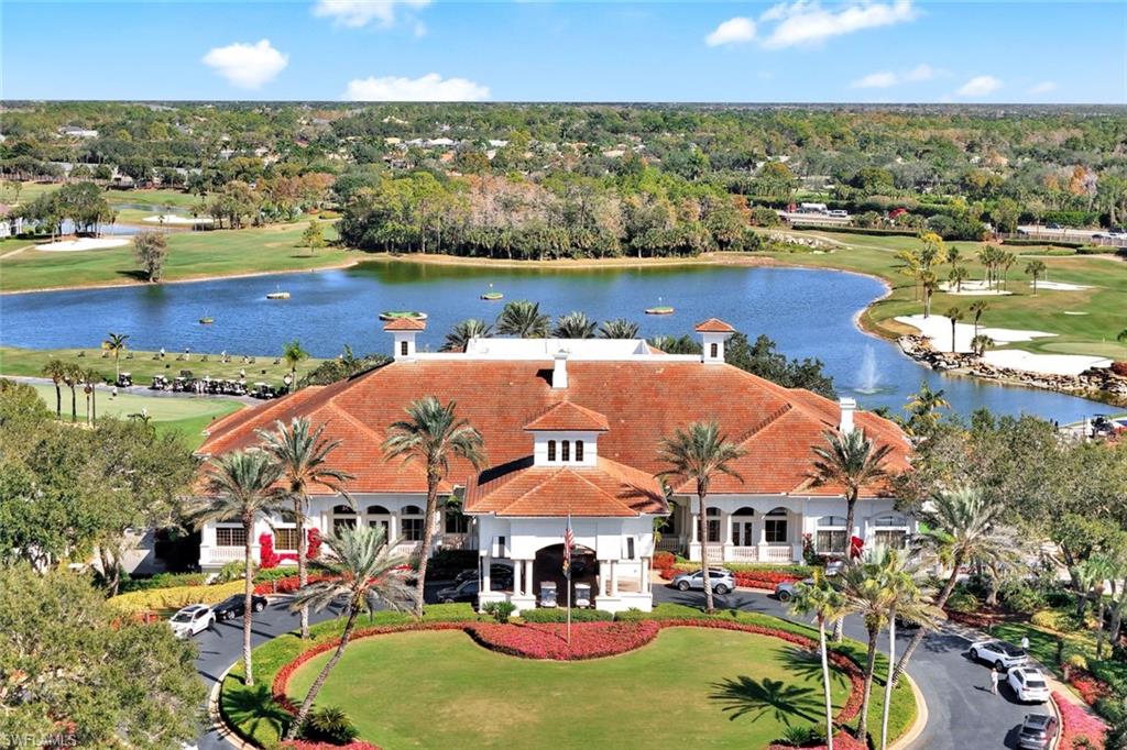 5967 Sand Wedge Lane, Unit 104 Naples, FL 34110 - Photo 21 of 41 an aerial view of a house with a ocean view