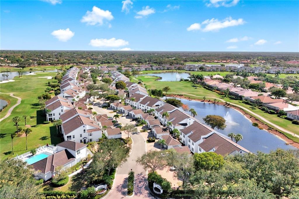 5967 Sand Wedge Lane, Unit 104 Naples, FL 34110 - Photo 22 of 41 an aerial view of residential houses with outdoor space