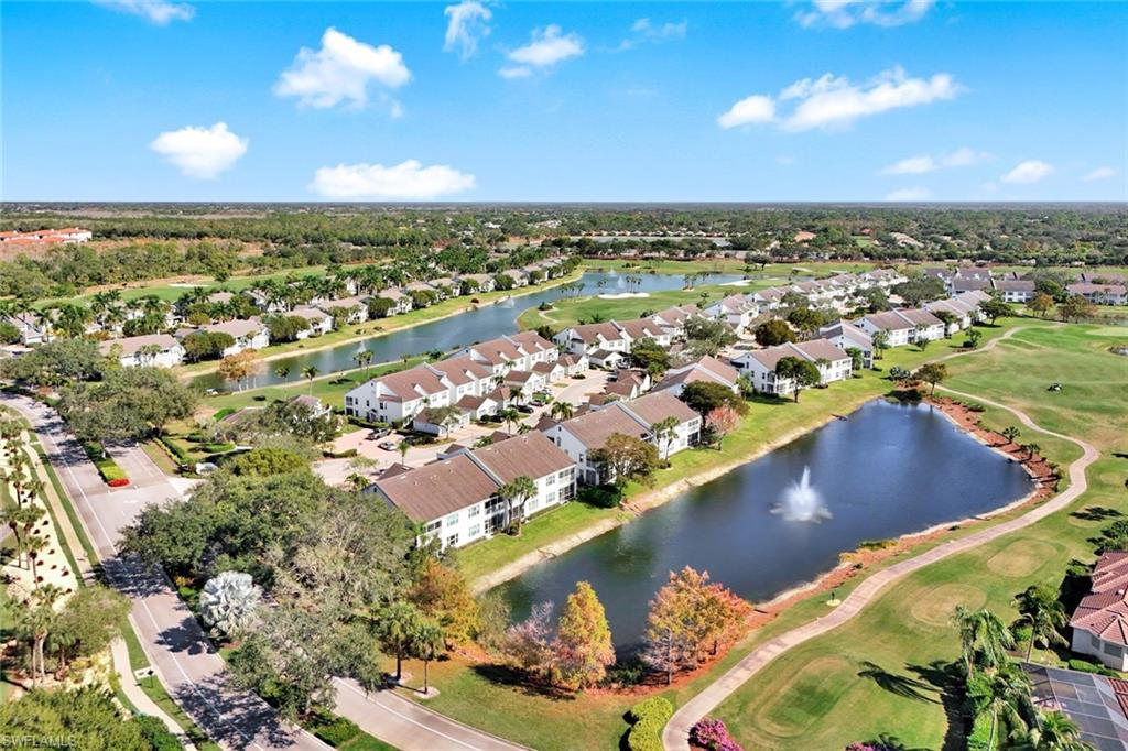 5967 Sand Wedge Lane, Unit 104 Naples, FL 34110 - Photo 23 of 41 an aerial view of residential houses with outdoor space