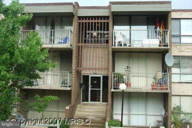 7965 Riggs Road, Unit 11 Hyattsville, MD 20783 - Photo 1 of 1 a view of a house with large windows